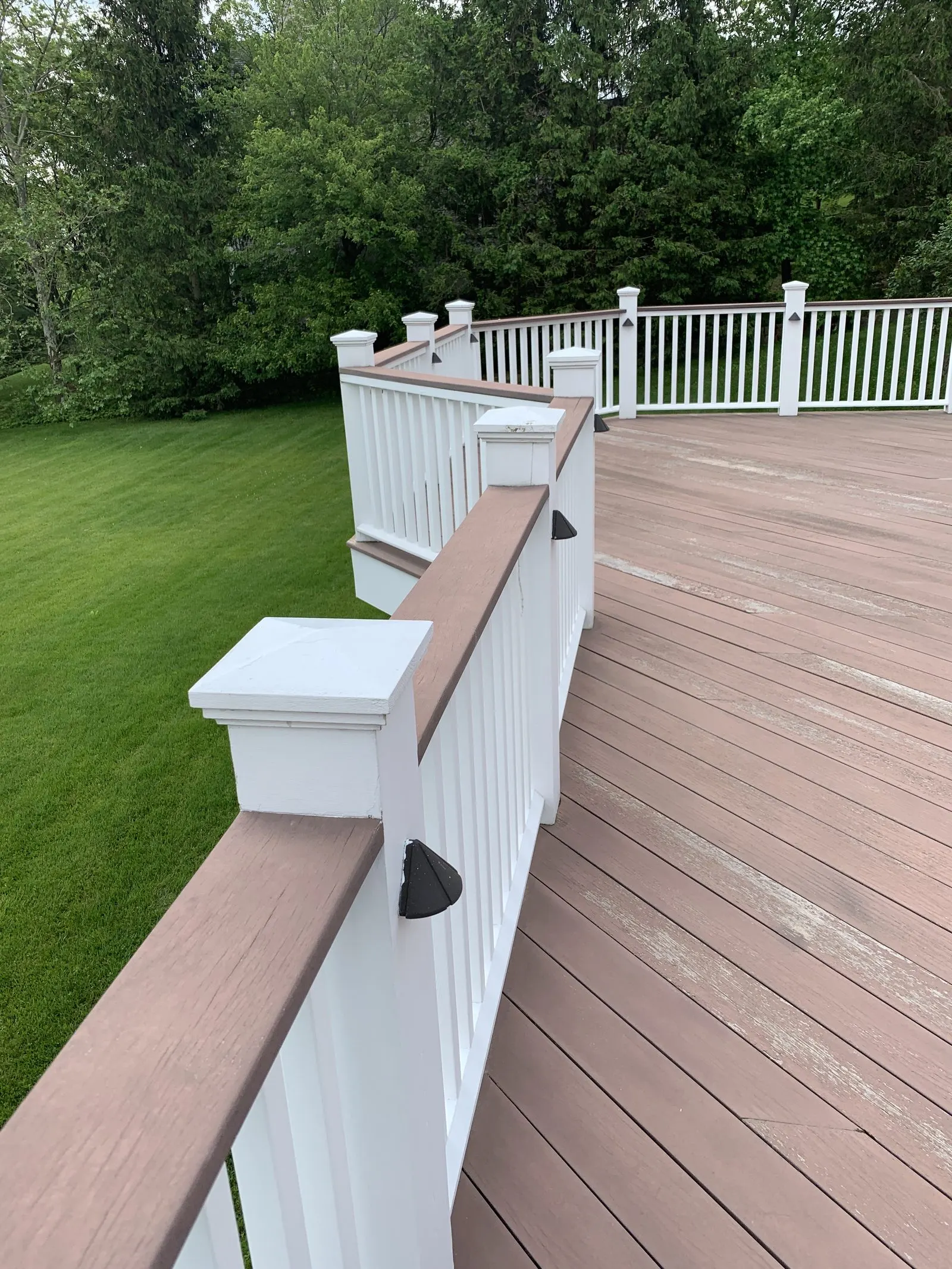 New composite deck with white railings in Carmel, NY