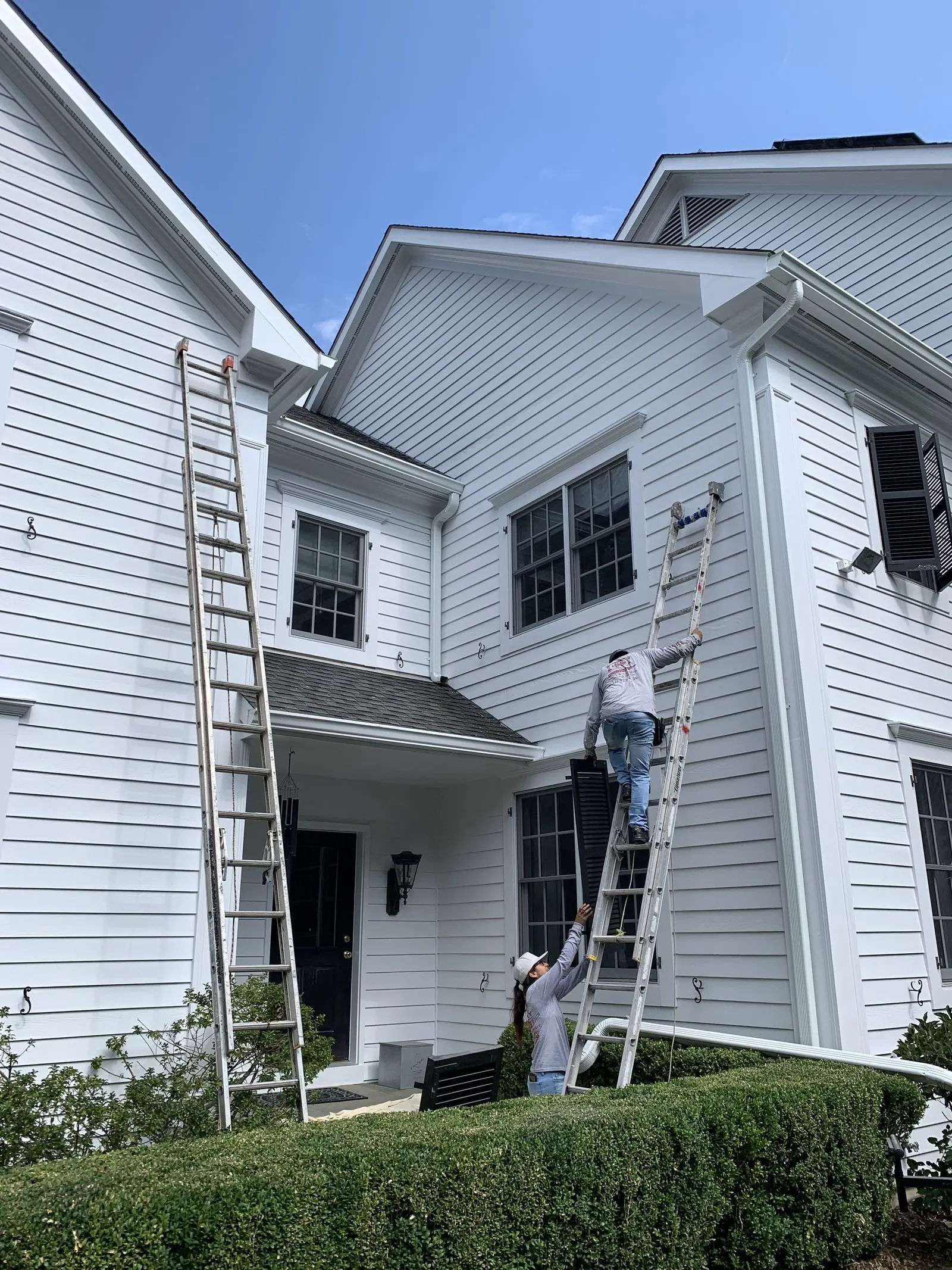 Exterior house painting on a columned home in Putnam County, NY