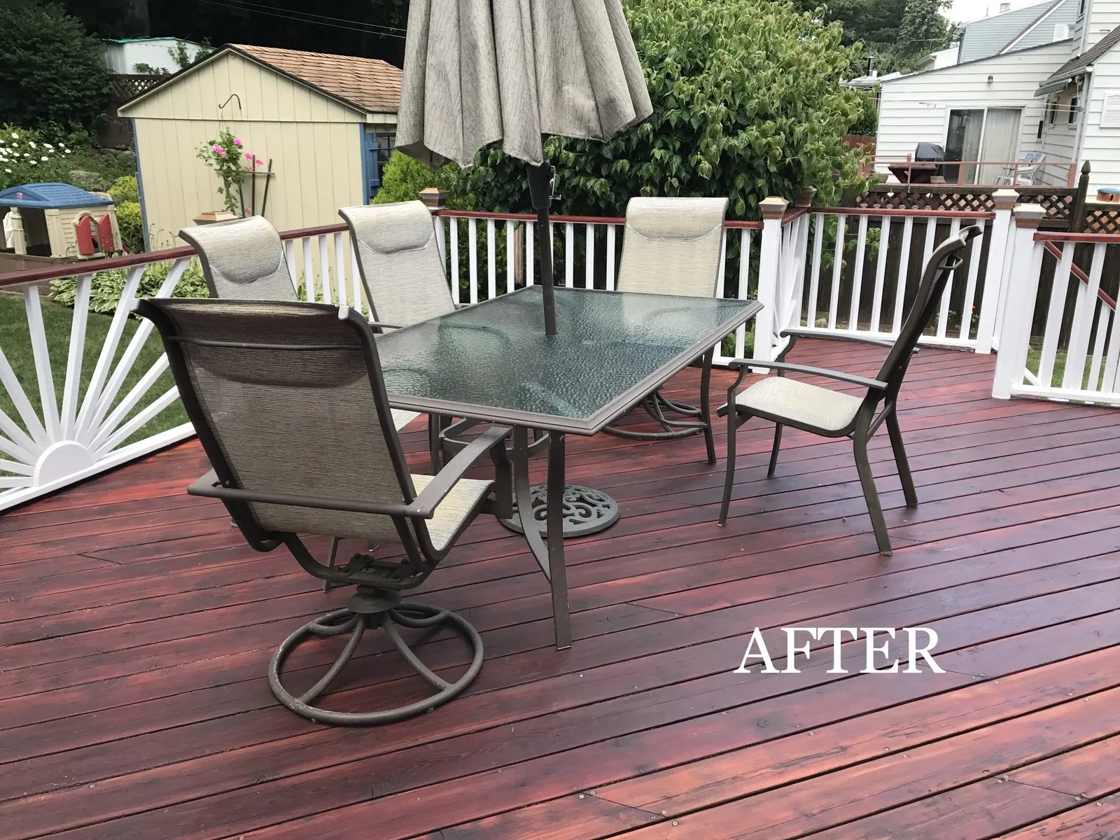 Deck staining with an outdoor living setup in Carmel, NY
