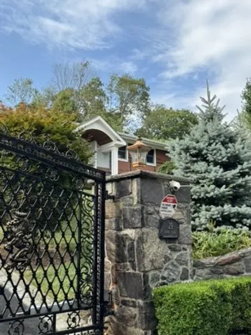 Iron driveway gate installation in Carmel, NY