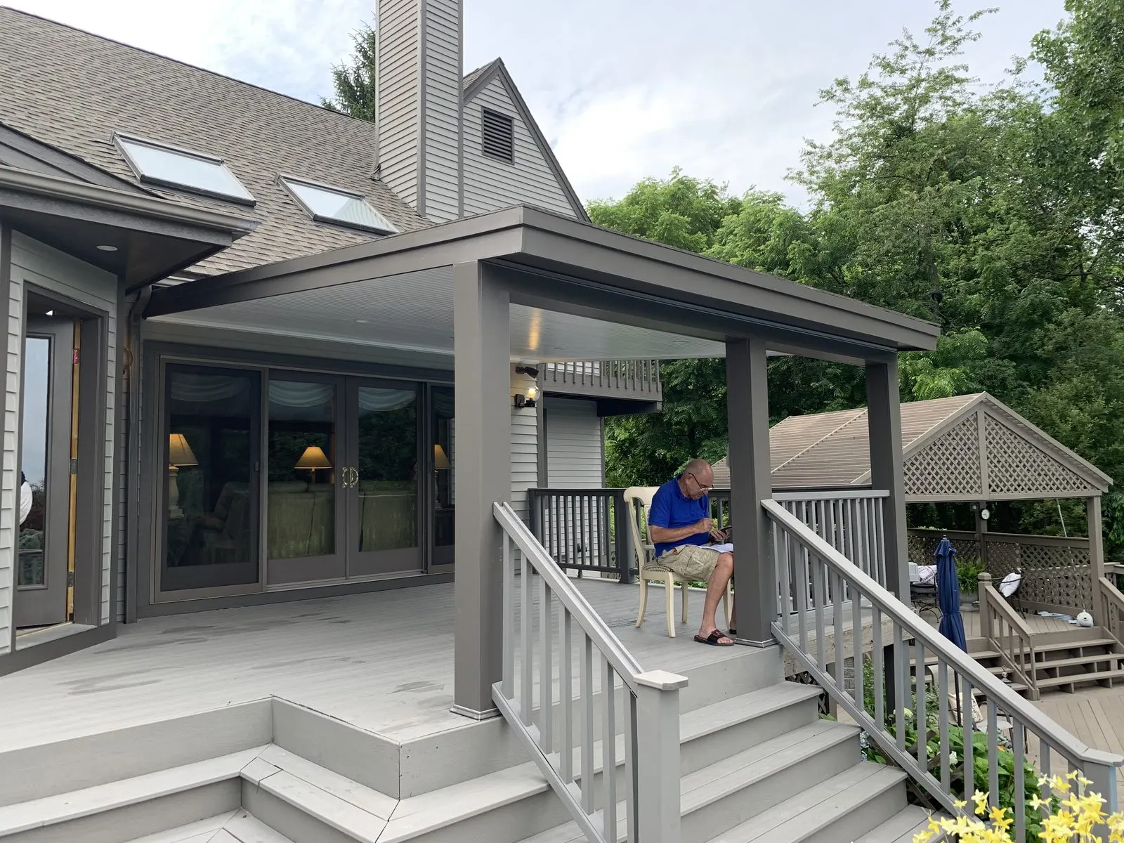 Exterior house painting with a refreshed front porch in Carmel, NY