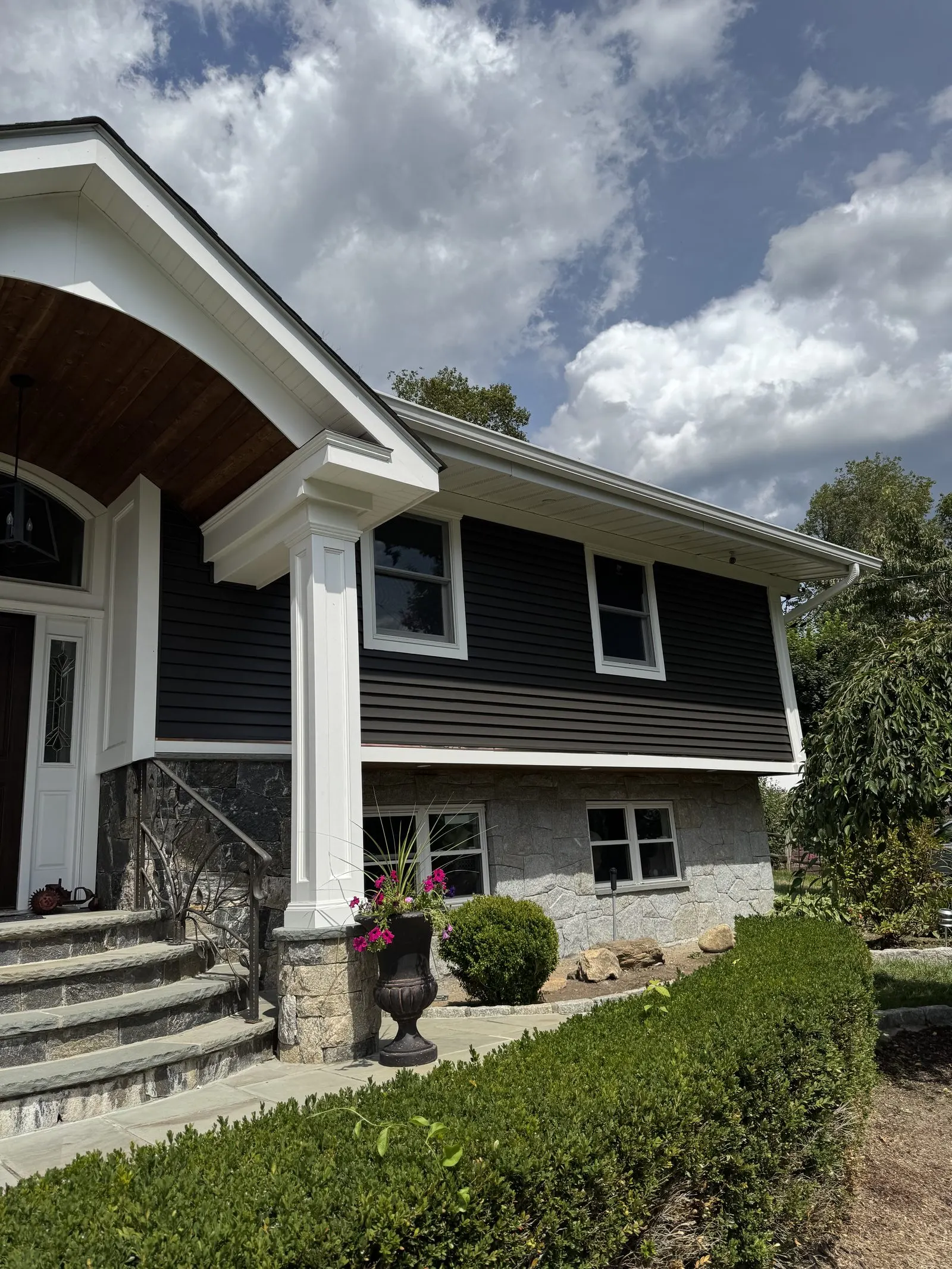 Siding installation with a wood accent gable in Carmel, NY