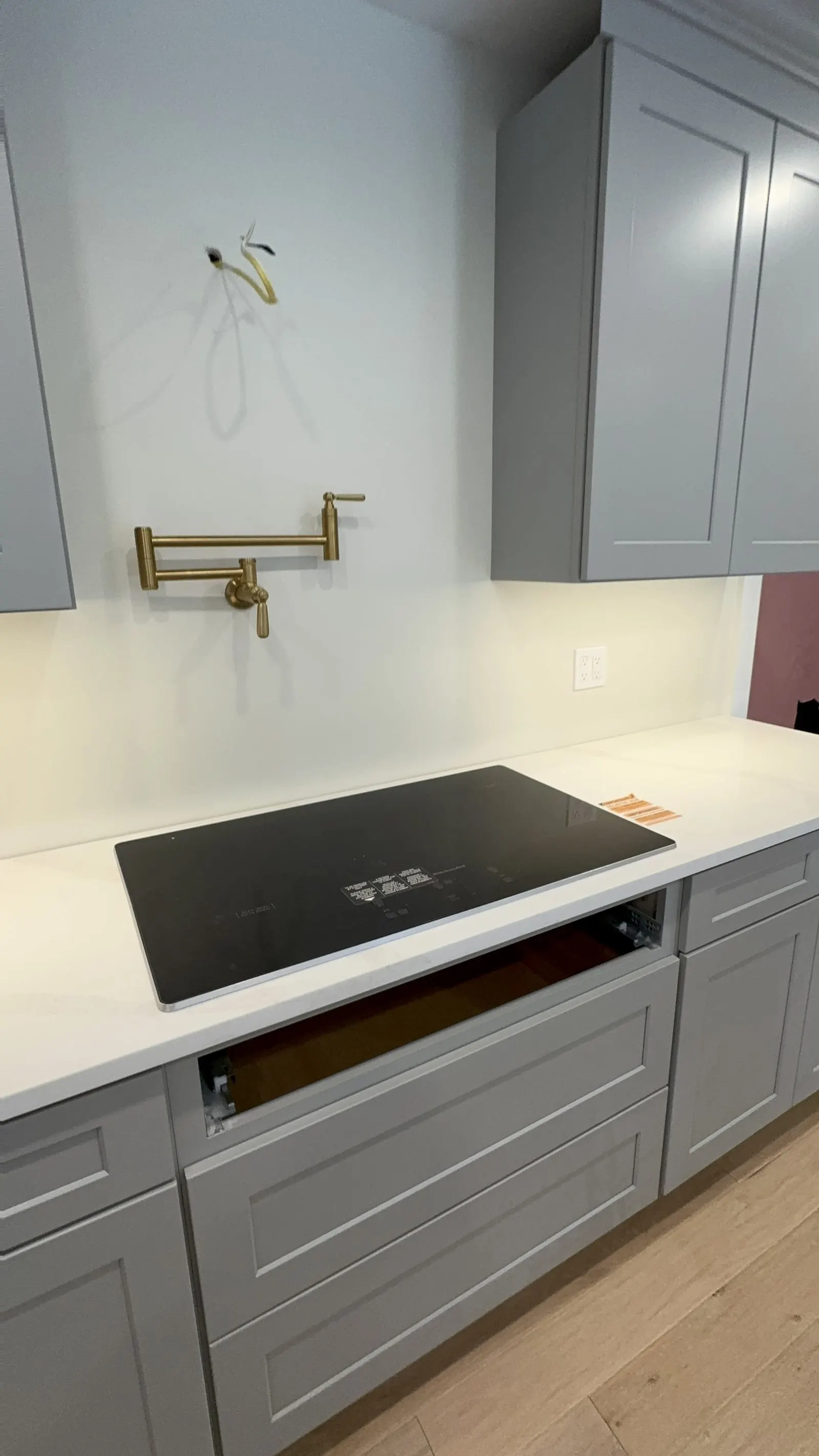 Kitchen remodel detail with a gold pot filler in Mahopac, NY