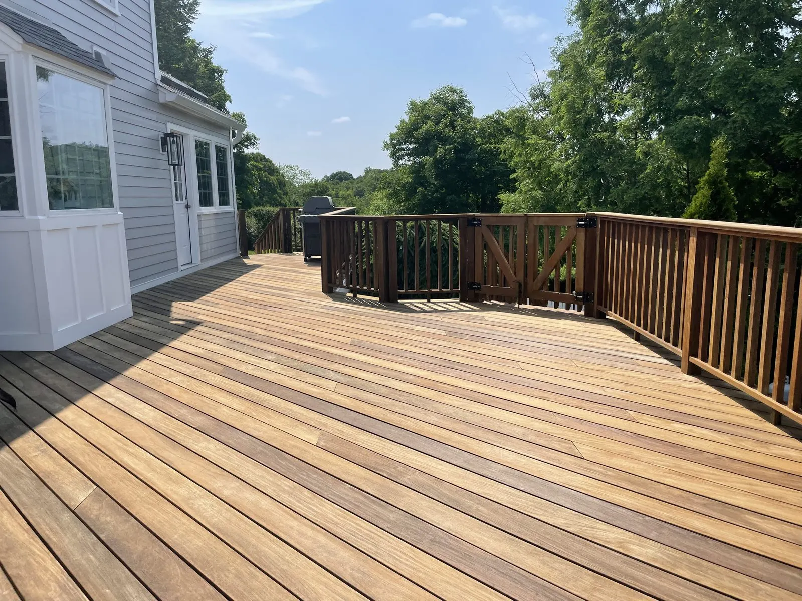 Freshly stained deck along the house in Putnam County, NY