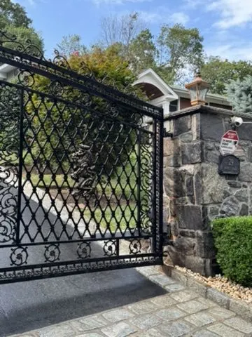 Custom iron double driveway gate in Somers, NY