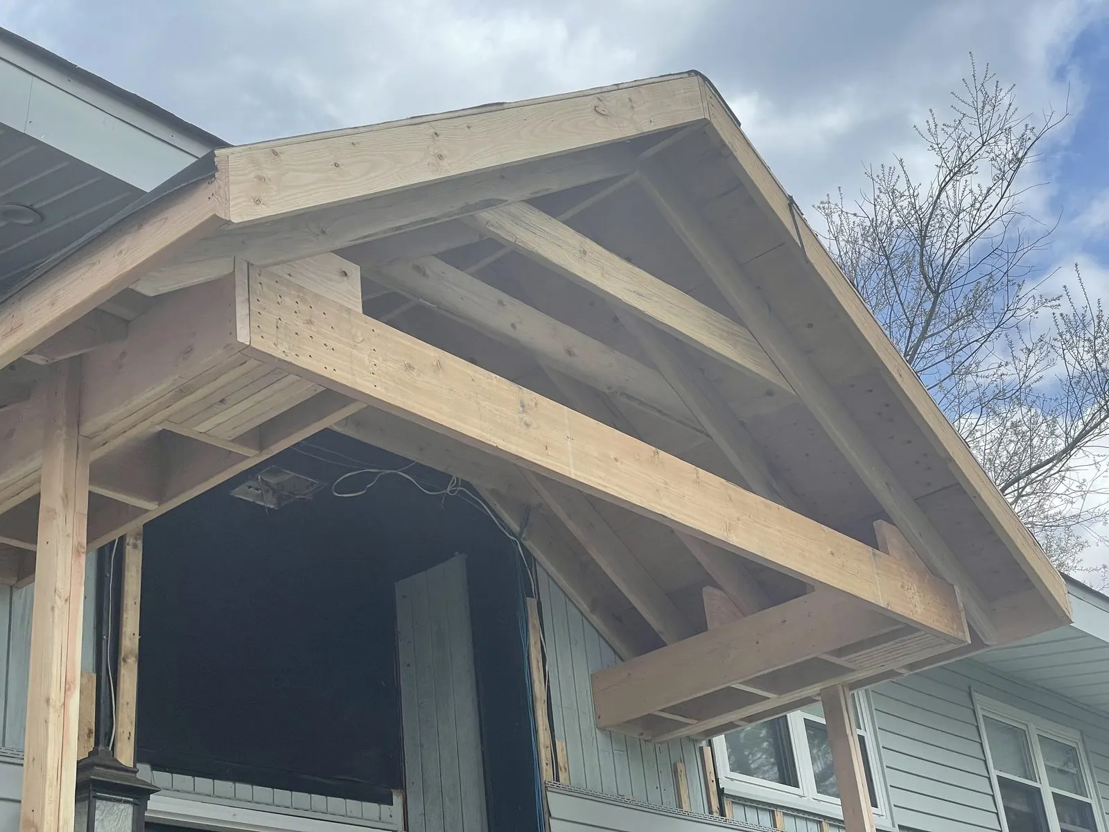Custom carpentry — gable bracket detail in Carmel, NY