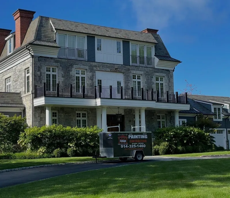 Exterior house painting on a home with a balcony in Mahopac, NY