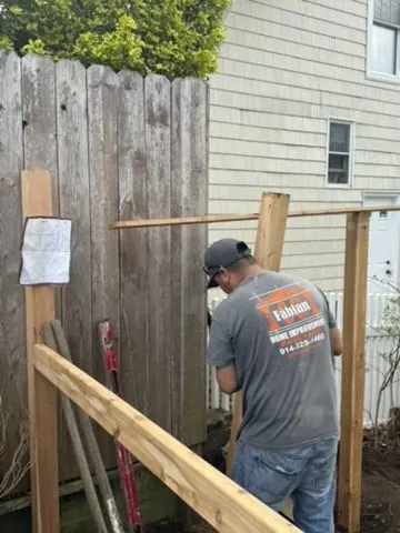 CC Fabian crew building a wood fence in Yorktown, NY