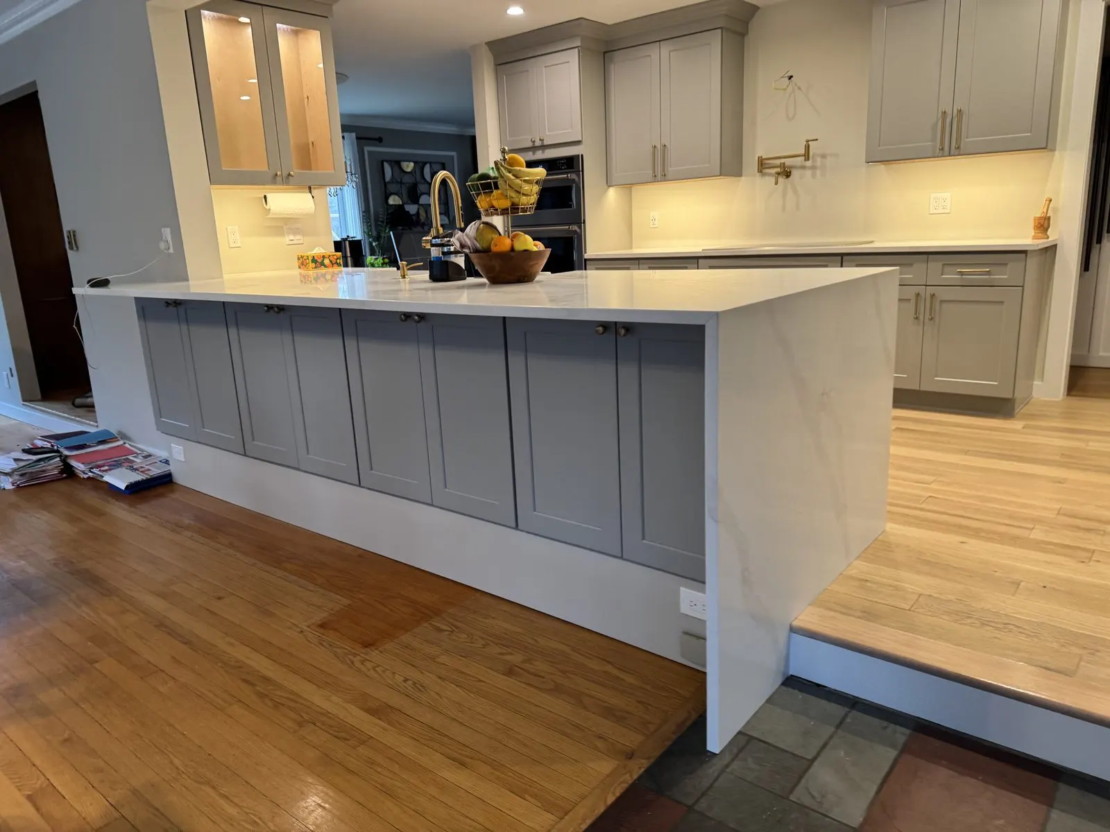 Kitchen remodel with a marble waterfall island in Westchester County, NY