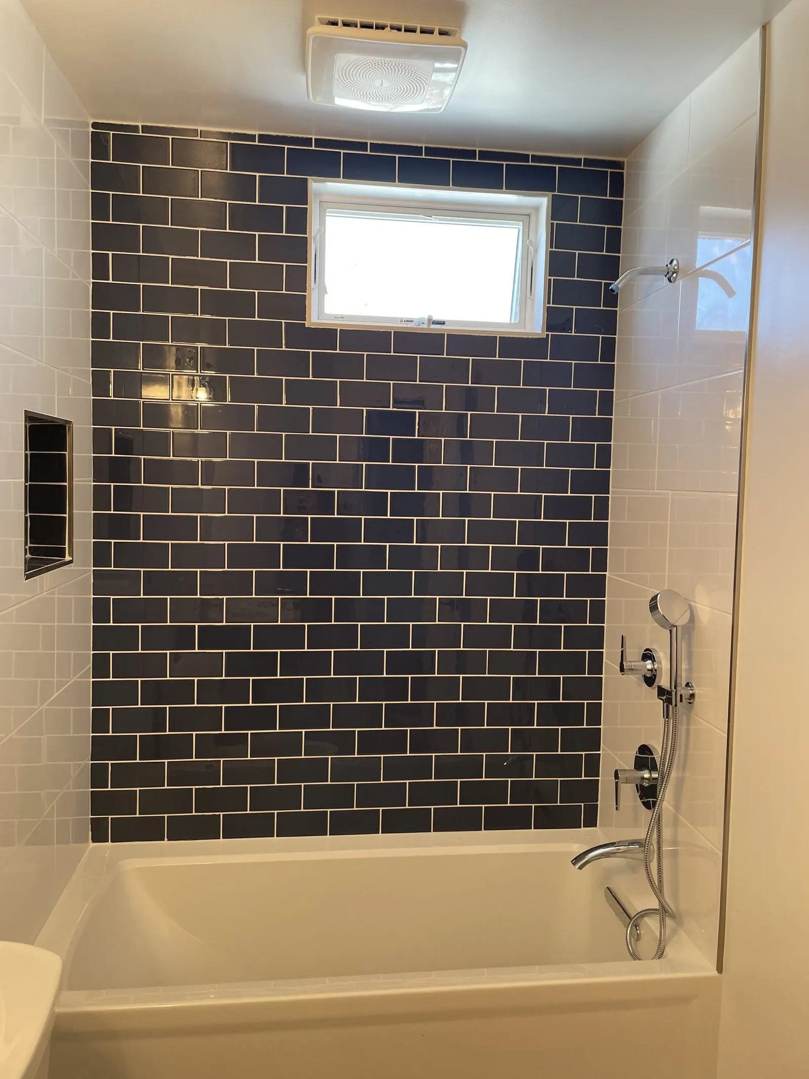 Bathroom remodel with a tiled shower and tub in Yorktown, NY