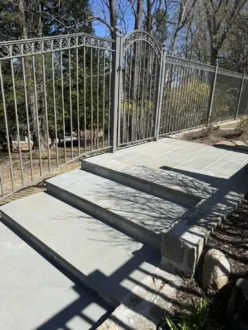 Ornamental double gate and fence in Putnam County, NY