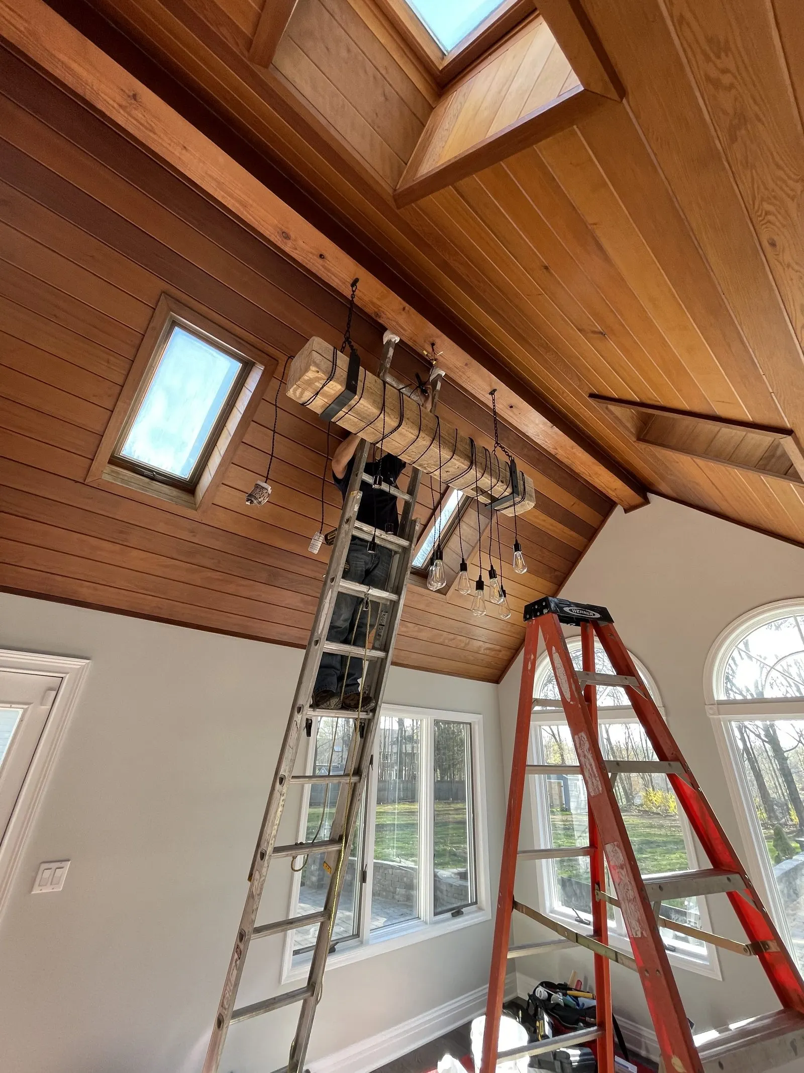 Interior painting on a vaulted-ceiling loft in Westchester County, NY