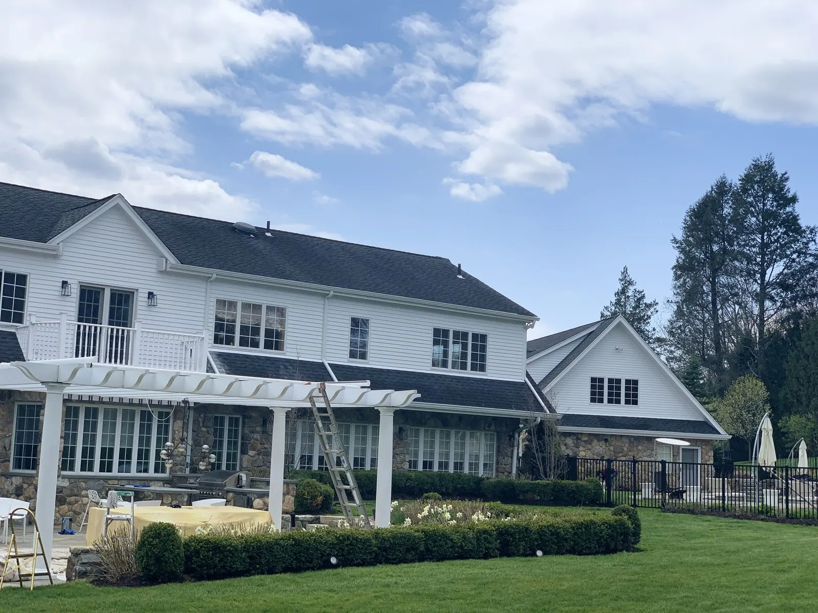Exterior house painting on a large home in Mahopac, NY