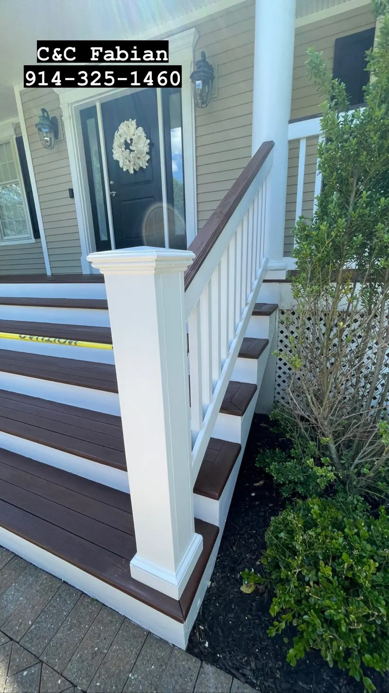 Deck build in progress with white railings in Carmel, NY