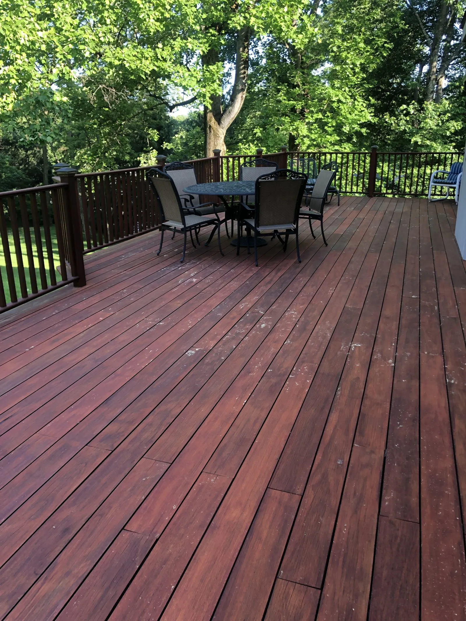 Rich deck staining on a wood deck in Putnam County, NY