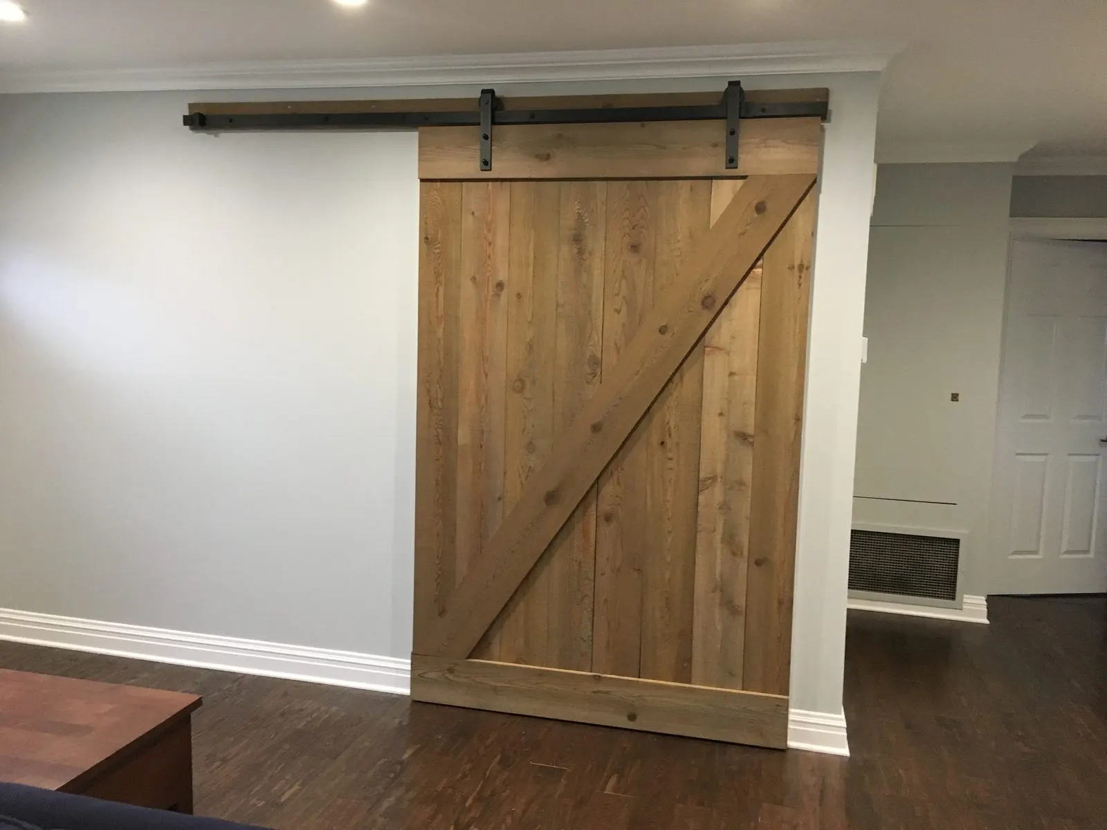 Finish carpentry — barn door and wainscoting in Mahopac, NY