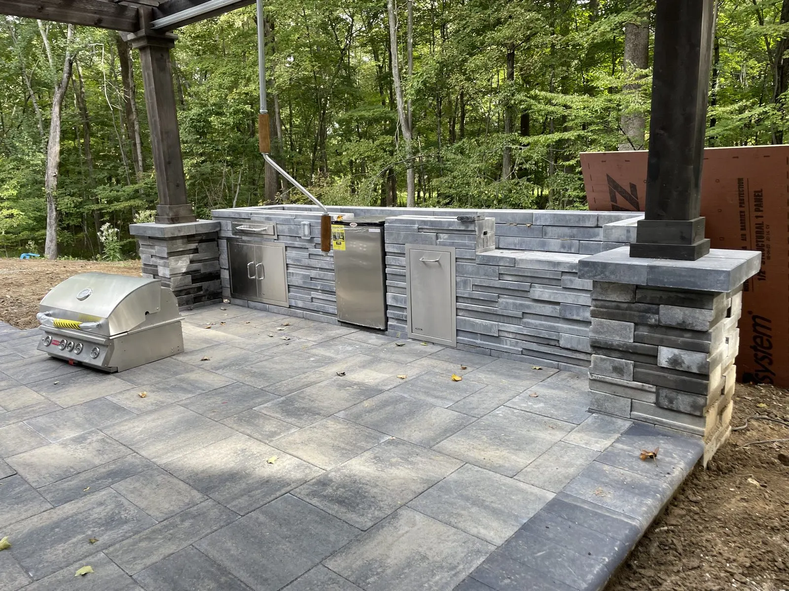 Paver patio with a seating wall in Carmel, NY
