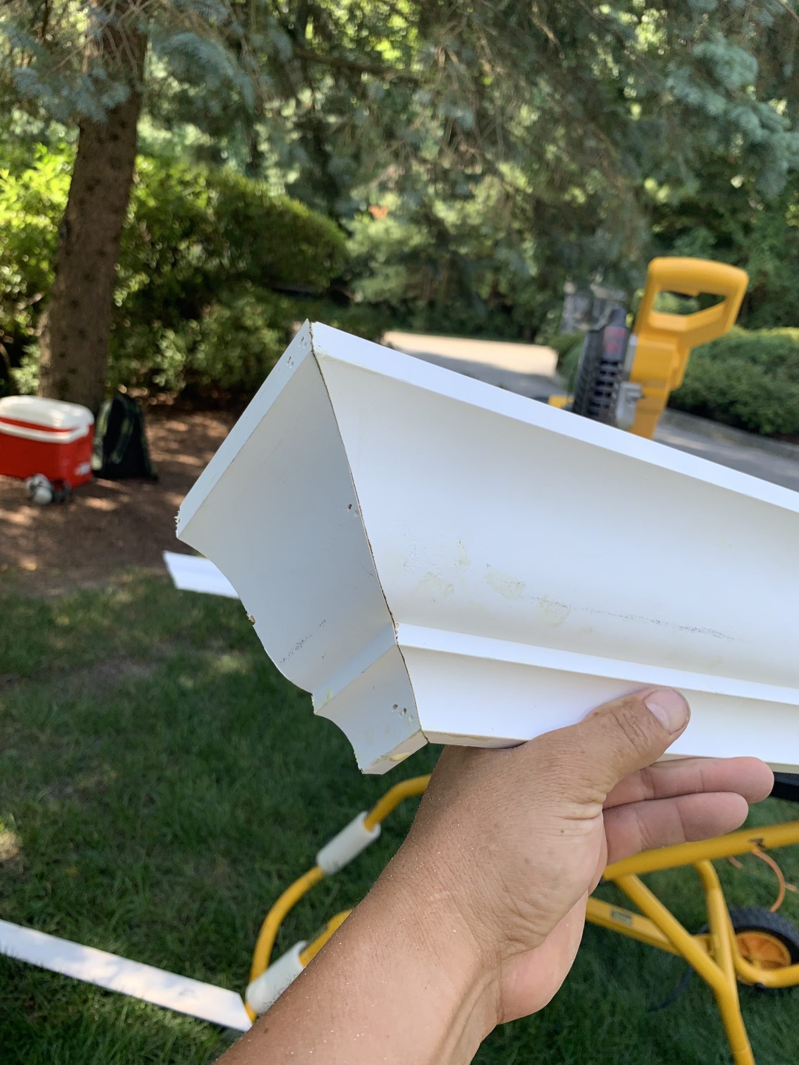 Holding white gutter section