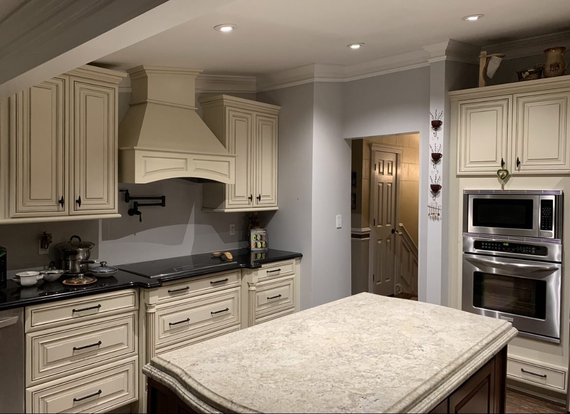 Cream kitchen with island and double oven