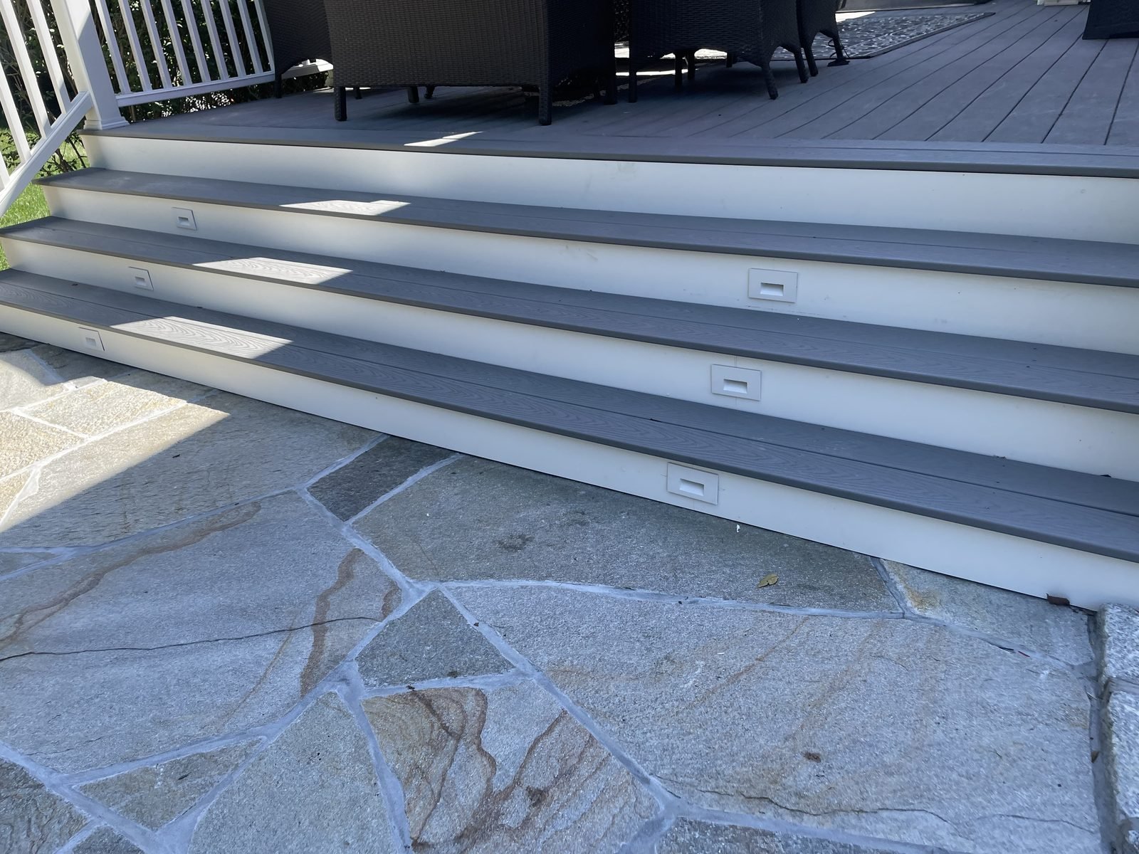 Wide stone steps and flagstone landing