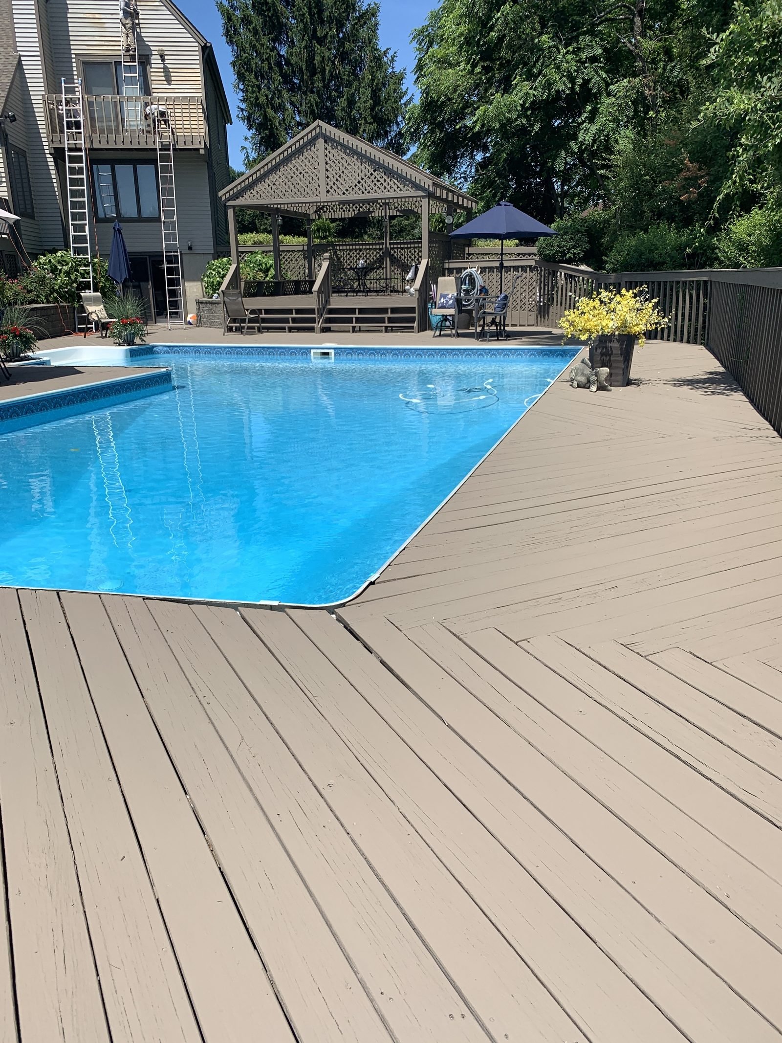 Installing tan siding on house